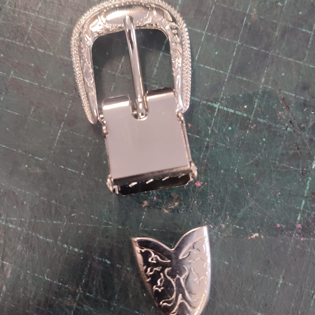 Nickle cowboy buckle with teeth
